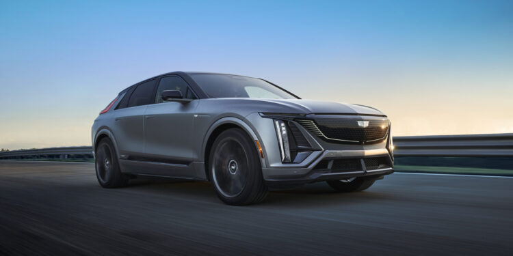 Front 3/4 view of the 2026 LYRIQ-V in Magnus Metal Frost. Preproduction model shown. Actual production model will vary. Magnus Metal Frost exterior color is extremely limited and late availability.